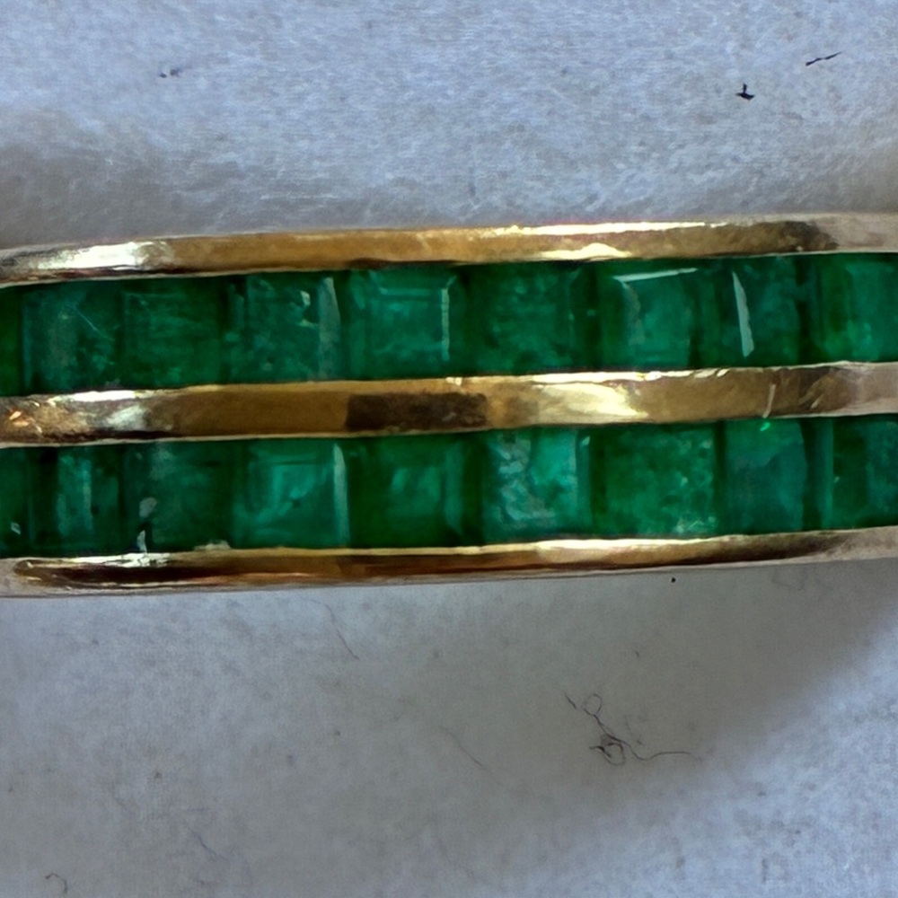 Elegant Emerald ring in 14k gold.  Size 7